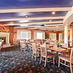 Magnuson Grand Pioneer Inn And Suites 